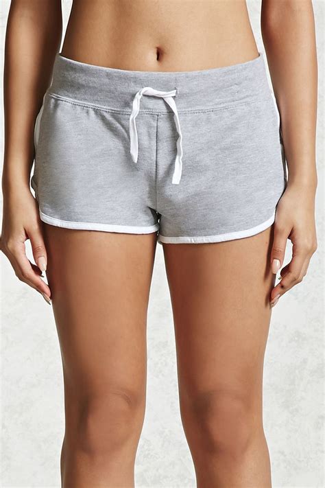 A Pair Of Athletic Inspired Knit Dolphin Shorts Featuring Contrast