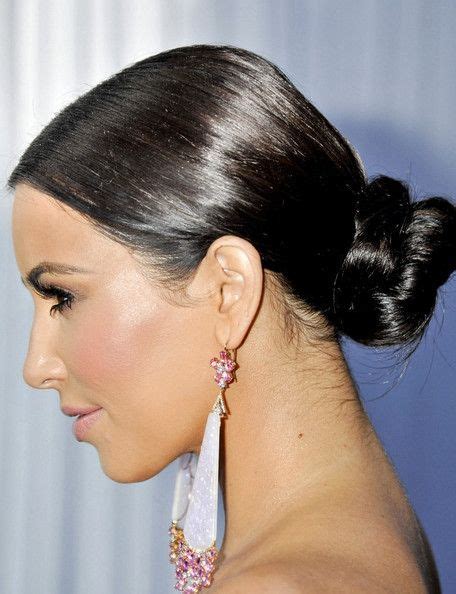 Kim Kardashian Wears A Slick Bun At The Nape Of Her Neck