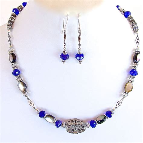 Lucky 17 Royal Blue Crystal Necklace And Earrings Earth And Moon Design