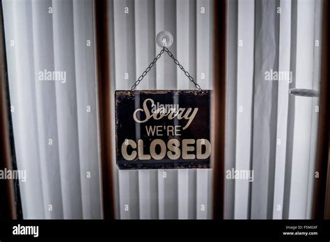 Sorry Were Closed Sign Hanging On A Door Stock Photo Alamy