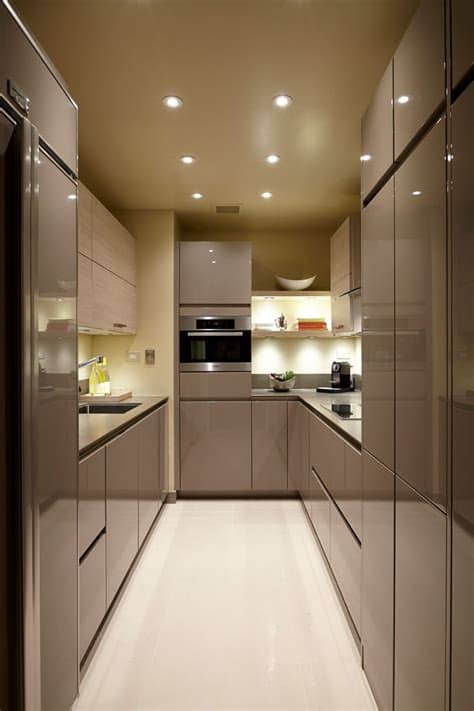 In an effort to add more light to the space, the ceiling is covered in a textured orange. 2012 small modern kitchen ideas - DECOOR