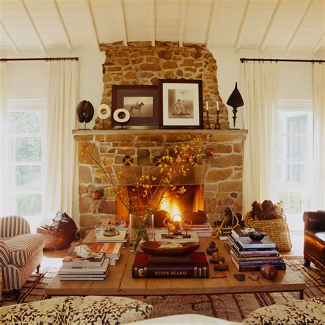 White country living room with black coffee table. Rustic Stone Fireplace - Country - living room - Martyn ...