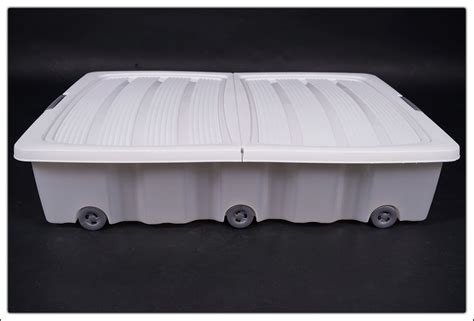 Мария положила белье на кровать. XXL Unterbettkommode weiß 60 L - Unterbettbox Rollenbox ...