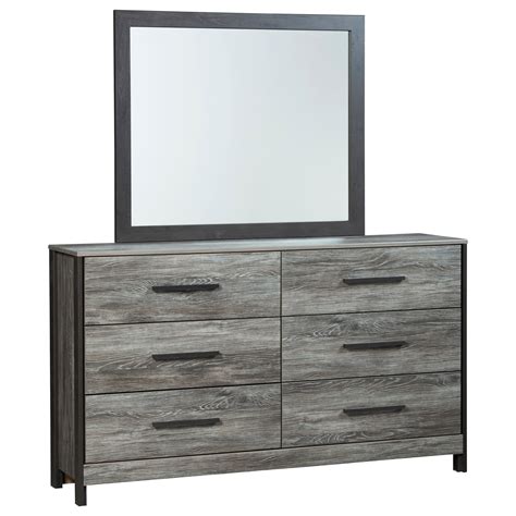 The upholstered panel is made with a medium gray velvet texture fabric and accented with large square button tufts. Signature Design by Ashley Cazenfeld Modern Rustic Dresser ...