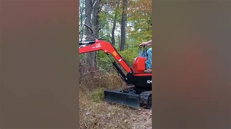 Logging with Gardner's GroundHog Mini Excavator - YouTube