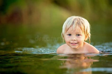 Child At Lake Stock Image Image Of Blue Smiling Vertical 10678107