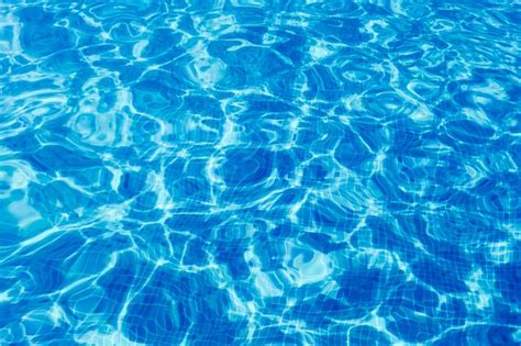 Premium Photo Swimming Pool Water Ripple Water Sun Reflection Background