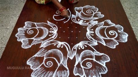 This collection will be useful if we are looking for a rangoli design for this occasion. Pongal Kolam Rangoli Pulli Kolam / Pongal Kolam Designs ...