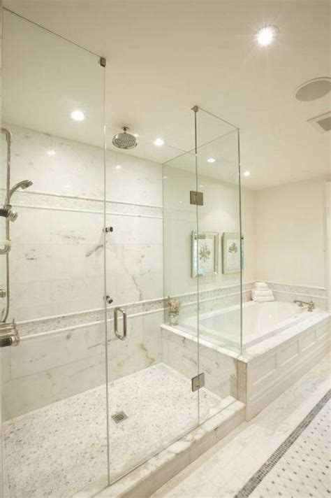 This giant walk in shower centered primary bath will send you soaring to the top of a luxury resort penthouse suite. 25 Amazing Walk In Shower Design Ideas