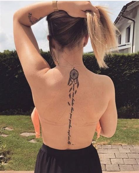 Wisdom between the shoulder blades. %%title%% in 2020 | Neck tattoo, Spine tattoos, Spine tattoos for women