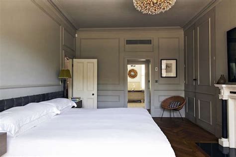 In our case, the natural greens in the plants surrounding the entryway served as inspiration, as well as the gray undertones in the flagstone. Edgy and Moody in Chiswick - Remodelista