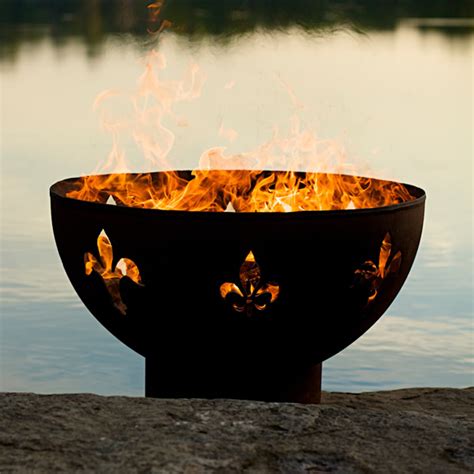 This fire pit is an ideal blend of contemporary modern design and natural elements with beautiful whimsical celestial star and moon accents. Fleur De Lis Fire Pit | WoodlandDirect.com: Outdoor Fireplaces: Fire Pits - Wood, Fire Pit Art