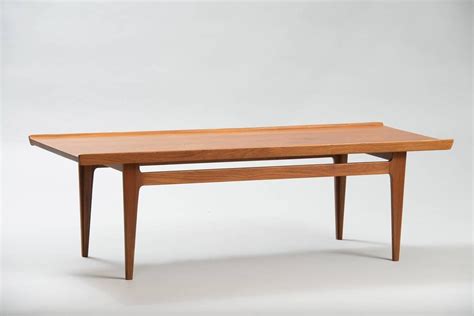 Looking for a coffee table that will perfectly blend in with your room décor? Finn Juhl Coffee Table at 1stdibs