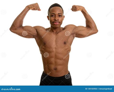 Young Muscular African Man Flexing Both Arms Stock Photo Image Of