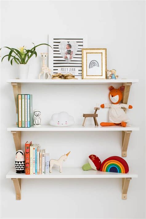 A Tiny Nursery With Huge Style Kids Room Shelves Modern Girls Rooms