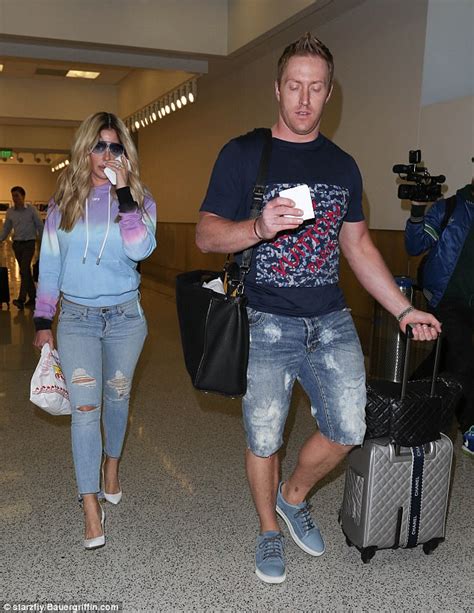 Kim Zolciak Flashes Her Cleavage With Husband In Atlanta Daily Mail Online