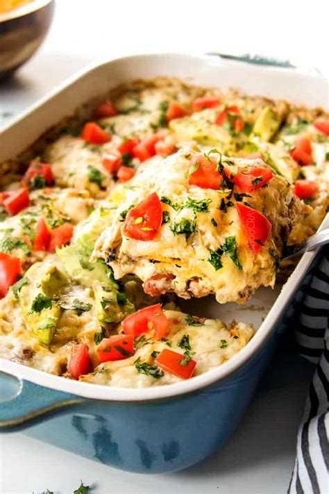 Add the cream cheese, sour cream, 1/2 cup of enchilada sauce, corn, green chiles, 1/2 cup of monterey jack, 1/2 cup of cheddar, cumin, and chili powder to a mixing bowl and stir until well combined. BEST Chicken Enchilada Casserole (Make ahead & freezer ...
