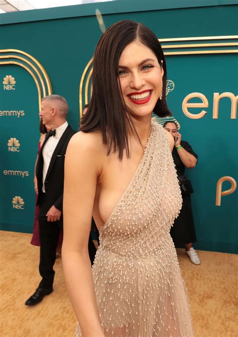 alexandra daddario flaunts her braless tits in a see through dress at emmy 2022 21 photos