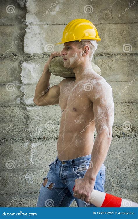 Sexy Muscular Construction Worker Shirtless Working Outdoor Wearing