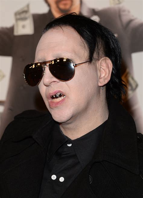Marilyn manson looks like himself without it, and with the makeup, he looks like himself, that is who he is. Marilyn Manson Photos - Premiere Of HBO's Final Season Of ...