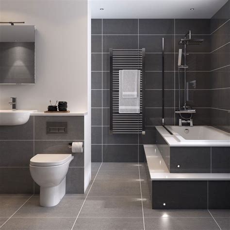 Large primary bathroom featuring white walls and tiles flooring, along with a large freestanding tub and a floating vanity with two vessel sinks. 60x30cm Super Polished Dark Grey Porcelain Tiles | Dark ...