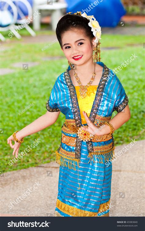 Portrait Of The Thai Beautiful Girl In Thai Style Traditional Suit