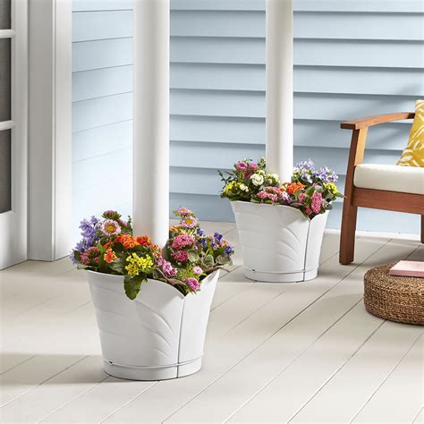 Maybe you would like to learn more about one of these? The Wrap Around Deck Post Planter - Hammacher Schlemmer