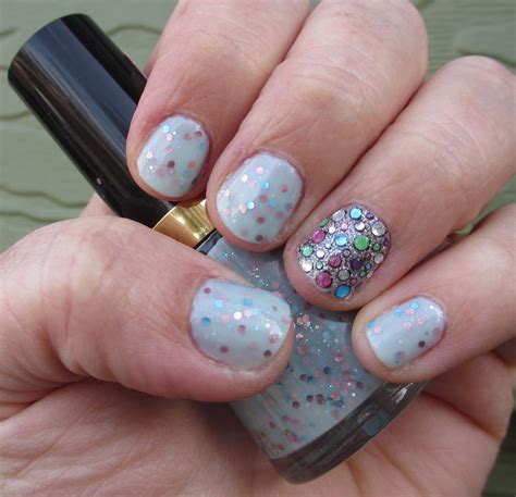 Revlon Whimsical with Kiss Nail Dress accent | Nail polish designs