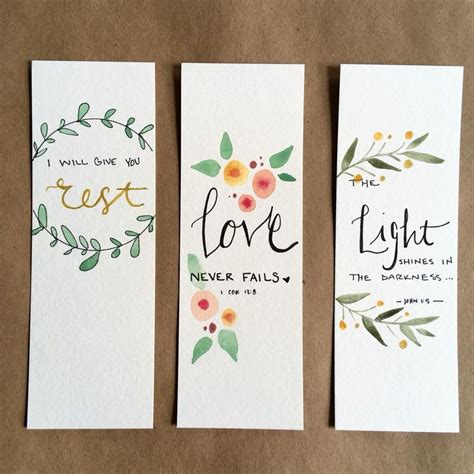 Three Watercolor Bookmarks With The Words Love And Light Written On Them