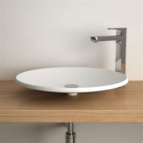 Un design simple et artisanal, à l'aspect scandinave, combiné à des fonctions modernes. Pack Vasque à poser ronde Aeka, 50 cm + Mitigeur haut Century
