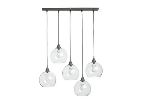 Four Clear Glass Globes Hanging From A Ceiling Fixture