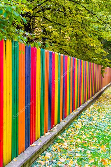 Multi Colored Rainbow Wooden Fence In Autumn Stock Photo By ©daliu 95748052