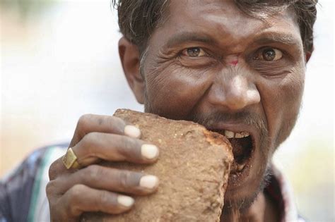 Photos Meet Indian Man Addicted To Eating Mud Bricks And Rocks