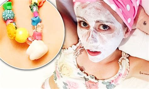 Miley Cyrus Makes Necklace From Own Tooth After Operation Daily Mail