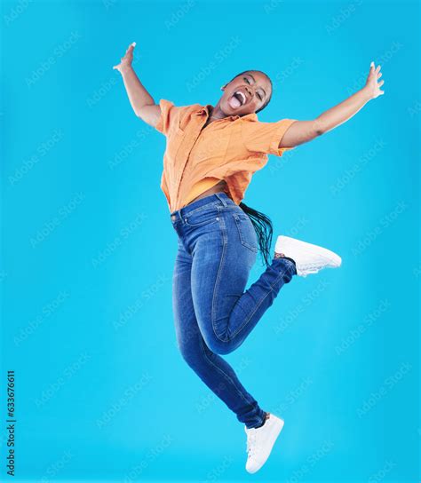 Jump Black Woman And Excited Portrait With Motivation In Studio From
