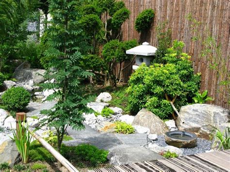 It is a small table for two that is shaded by a forest of rather large bamboo trees. 32 Backyard Rock Garden Ideas