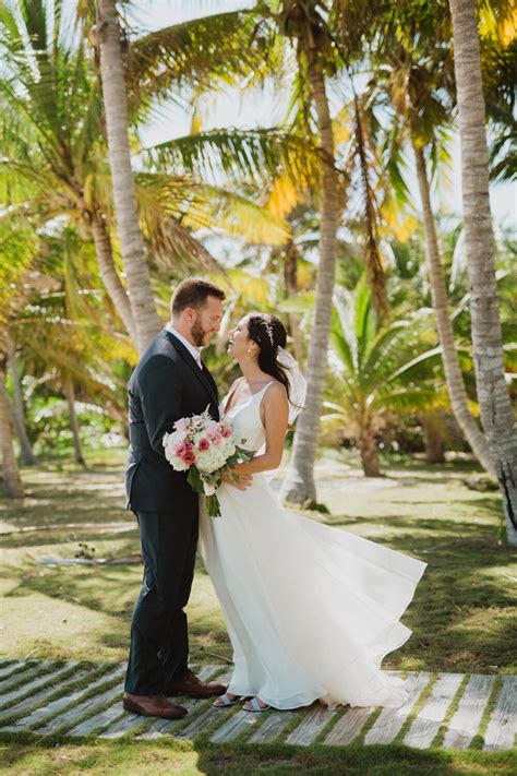 Bride And Groom Under Palm Trees Wedding Portraits Palm Trees Bride