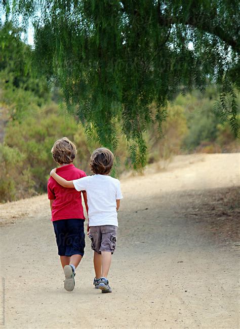 Boys Walking Trail Best Friends By Stocksy Contributor Monica Murphy Stocksy