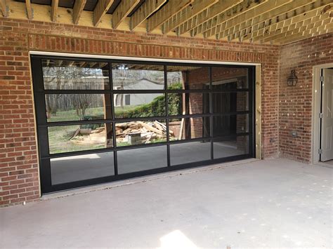 Full View Glass Basement Garage Door Installed In Winder Ga