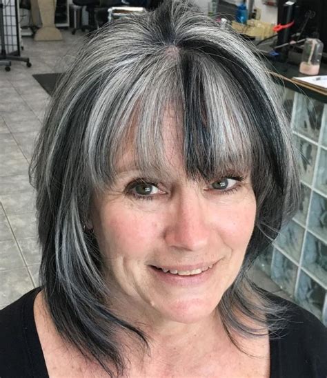 For older women with fine hair, getting volume by adding short, feathered layering towards the top really helps make your hair appear thicker. 21 Glamorous Grey Hairstyles for Older Women - Haircuts ...