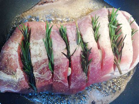 Place pork in large roasting pan. Oven-roasted pork loin with rosemary and potatoes ...