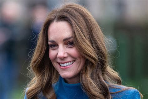Kate Middleton Goes Monochrome In A Navy Coat Tailored Trousers