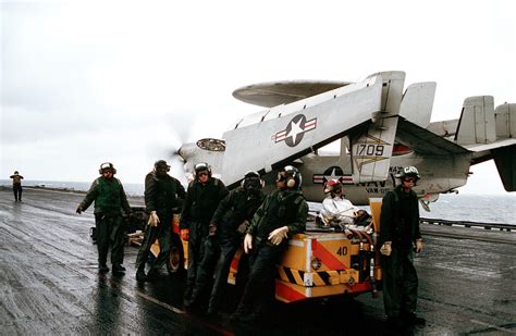 Flight Deck Crewmen Aboard The Aircraft Carrier Uss Midway Cv 41 Take