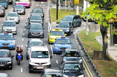Driving in and out of singapore. Tit for tax: after Singapore vehicle entry fee hike ...