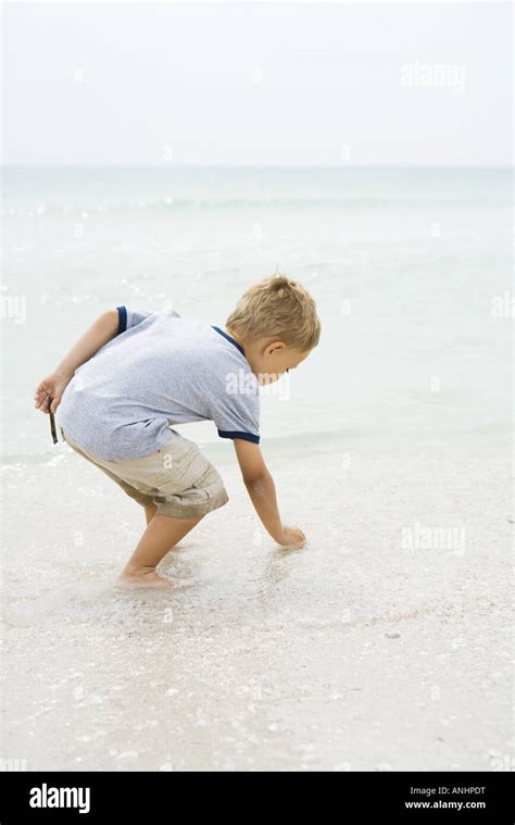 Child Bending Over Boy High Resolution Stock Photography And Images Alamy