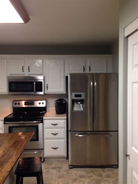 Thousands of hours of food care research and refrigeration experience has been programmed p top clearance — above refrigerator cabinet. Cabinet above refrigerator