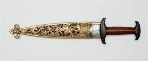 A Holbein Dagger Baselard With A Beautifully Wrought Gold Scabbard
