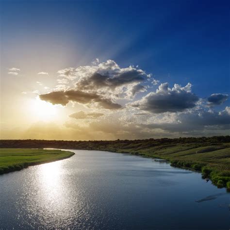 Spring Landscape Of Bright Sunrise Over River With Colorful Cloudy Sky