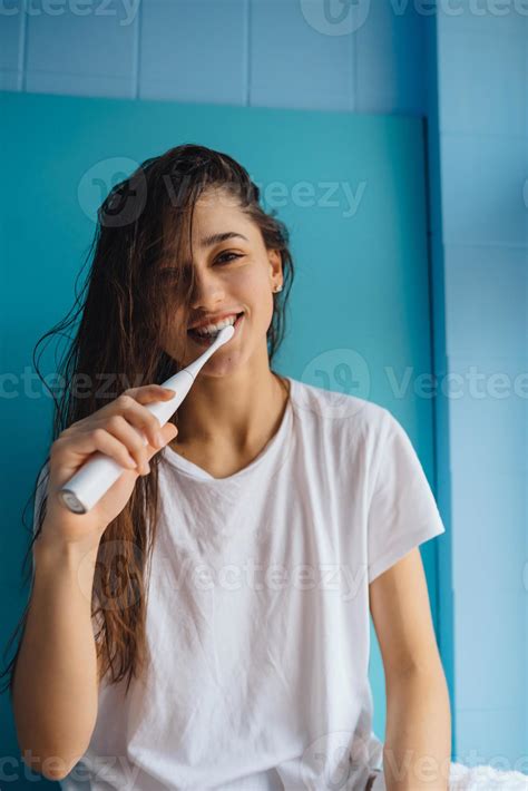 Young Beautiful Woman Brushing Her Teeth With Toothbrush 11519055 Stock