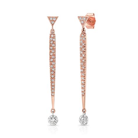 Pavé diamonds shimmer down the front of the earrings for added sparkle (1/10 total carat weight). 18K Rose Gold Diamond Drop Earrings - Bare Diamonds